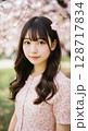 桜と若い女性［AI生成画像］ 128717834