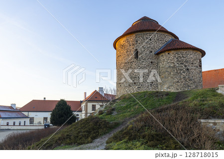 Rotunda of saint catherine illuminating the city of znojmo at sunset in czech republic 128718015