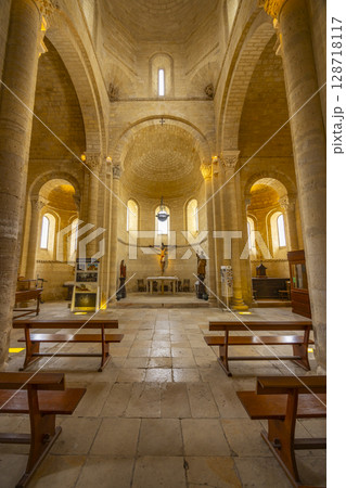 Interior of San Martin Church showing altar, benches and romanesque architecture in Fromista, Spain Interior of San Martin Church showing altar, benches and romanesque architecture in Fromista, Spain 128718117