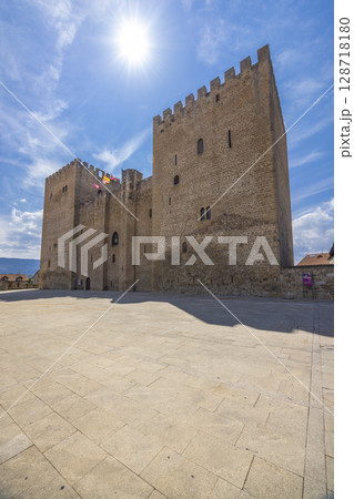 The Alcazar of the Medina de Pomar Castle shining under the summer sun in Castilla and Leon, Spain The Alcazar of the Medina de Pomar Castle shining under the summer sun in Castilla and Leon, Spain 128718180