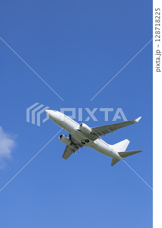 Passenger Airplane Flying Over Hostivice, Czechia 128718225