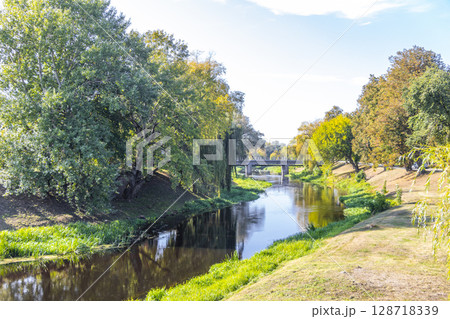 Beautiful river nature bridge and blue sky Brest Fortress Belarus. Beautiful river nature bridge and blue sky Brest Fortress Belarus. 128718339