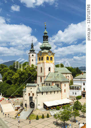 Church of the Assumption of the Virgin Mary dominating Namestie Stefana Moysesa square in Banska Bystrica, Slovakia 128718798