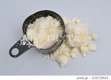 Sodium Oleate powder on light grey background. 128718924