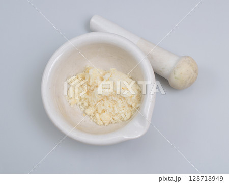 Sodium Oleate powder on light grey background. 128718949