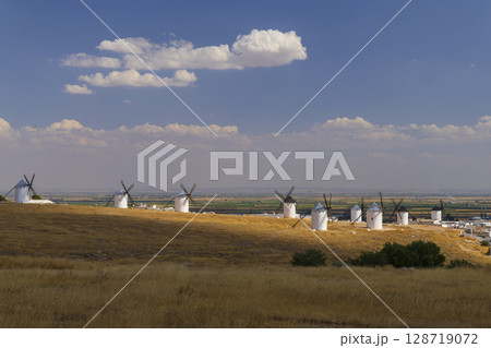 Traditional windmills standing on a hill in Campo de Criptana, Spain 128719072