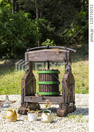 Old wooden wine press standing in Velky Krtis, Slovakia Old wooden wine press standing in Velky Krtis, Slovakia 128719253