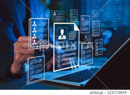 Digital resume screening by hr professional. Human resource manager evaluate resumes or CV online, modern recruitment and candidate selection processes. The best employees for corporate business. 128719644