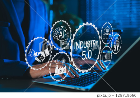 Industry 5.0 Concept. Person using laptop with Industry 5.0, AI icons, smart factory, connectivity, advanced technology integration, human machine collaboration, and future of industrial innovation. 128719660