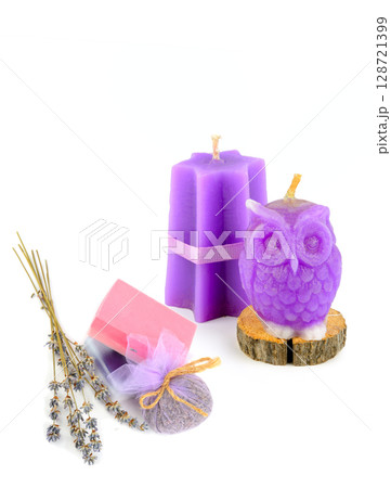 Soap and scented candles with lavender extract isolated on white background. Free space for text. Soap and scented candles with lavender extract isolated on white background. Free space for text. 128721399