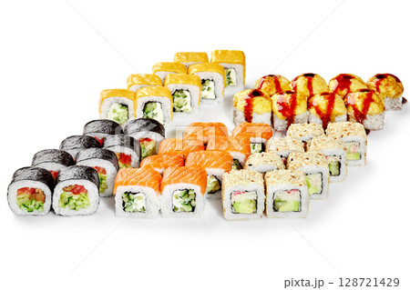 Variety of delicious sushi rolls displayed on white background Variety of delicious sushi rolls displayed on white background 128721429