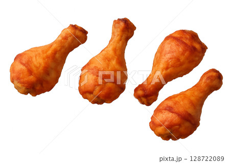 Crispy Fried Chicken Drumsticks Arranged on a White Surface for a Tasty Meal 128722089