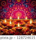 Traditional festival celebration with oil lamps and marigold flowers in evening 128724615