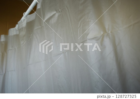 white plastic curtain texture in bathroom white plastic curtain texture in bathroom 128727325