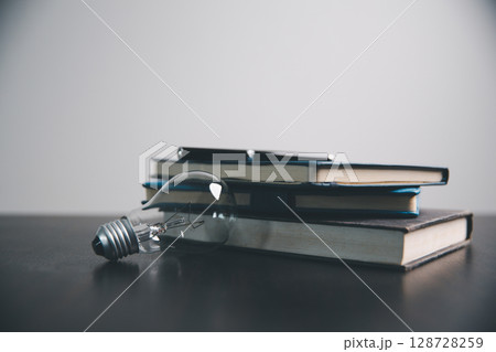 Concept education is business idea scholarship blur background essential globalization, saving students capital monthly learn and study in universities and advisor save involves books financial banner 128728259