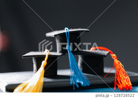 Concept education is business scholarship essential idea globalization, mortarboard students learn and study in universities and colleges master knowledge save involves financial management diploma Concept education is business scholarship essential idea globalization, mortarboard students learn and study in universities and colleges master knowledge save involves financial management diploma 128728522