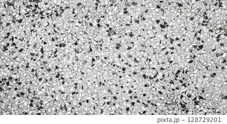 white background with rough sidewalk texture with pebbles. Surface of decorative pavement 128729201