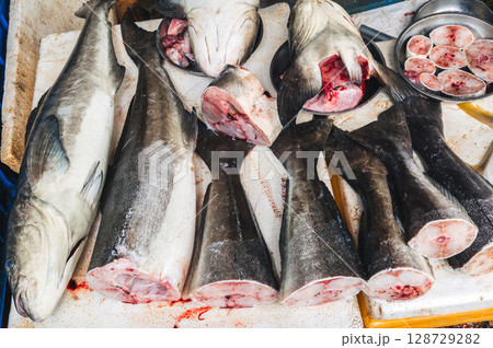 catch of assortment of fresh fish on counter at the Asian seafood market in Vietnam catch of assortment of fresh fish on counter at the Asian seafood market in Vietnam 128729282