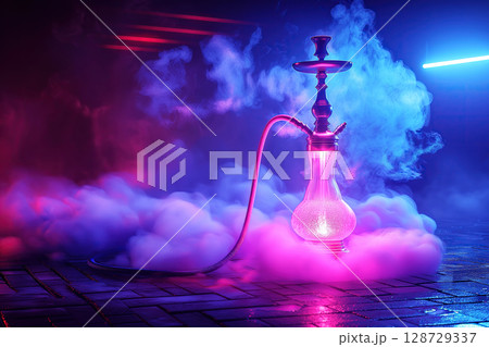 hookah in shisha smoke on background with colored neon light in bar room 128729337