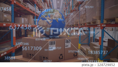 Displaying Earth globe resting on cardboard boxes in warehouse aisle, featuring floating barcodes 128729852