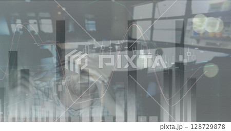Image of financial data processing over business people 128729878