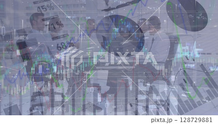Image of financial data and graphs over diverse businesspeople working in office 128729881
