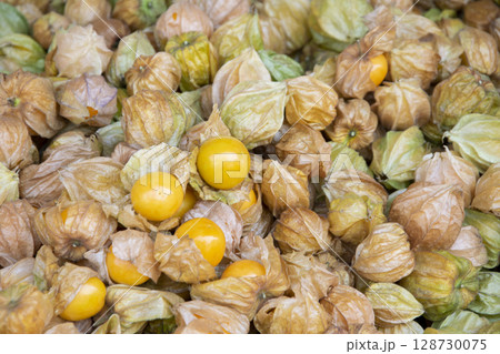cape gooseberry in the market. cape gooseberry background. cape gooseberry in the market. cape gooseberry background. 128730075