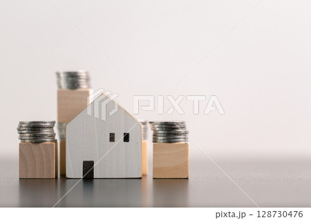 Business home concept involves strategic financial management money coin save bank real estate economic loan investment development growth encourage accountancy buy income stack investment economy 128730476