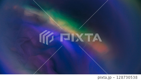 Paint spill. Colorful mix. Defocused blue purple neon round texture flowing droplets glitter rainbow water spreading on abstract blue background. 128730538