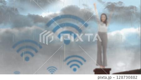 Image of wi fi icons over woman and rainy sky Image of wi fi icons over woman and rainy sky 128730882