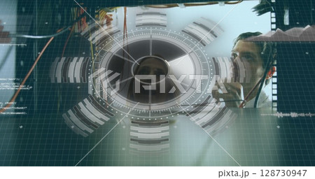 Image of data processing over caucasian man checking servers Image of data processing over caucasian man checking servers 128730947