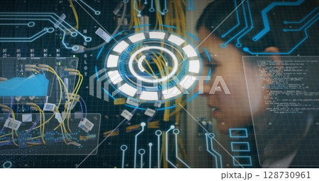 Image of round scanner and data processing over female engineer working at server room 128730961