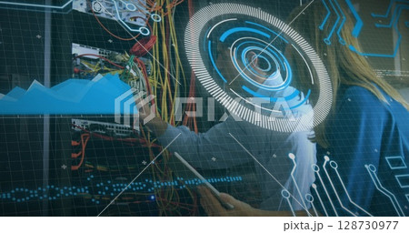 Image of data processing over caucasian male and female engineers working at server room Image of data processing over caucasian male and female engineers working at server room 128730977