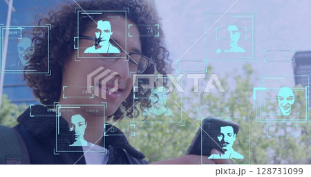 Image of arrows and icons over businessman using smartphone 128731099