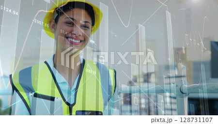 Image of financial data processing over businesswoman in office Image of financial data processing over businesswoman in office 128731107