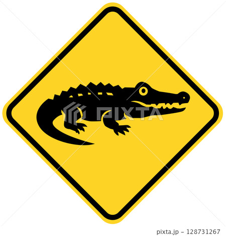 Crocodile on a road sign. Beware alligator road symbol. Crocodile road board. Yellow road sign Crocodile. 128731267