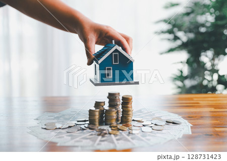 Business home concept involves strategic financial management money coin save bank real estate economic loan investment development growth encourage accountancy buy income stack investment economy Business home concept involves strategic financial management money coin save bank real estate economic loan investment development growth encourage accountancy buy income stack investment economy 128731423