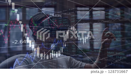 Image of data processing over african american man wearing vr headset 128731667