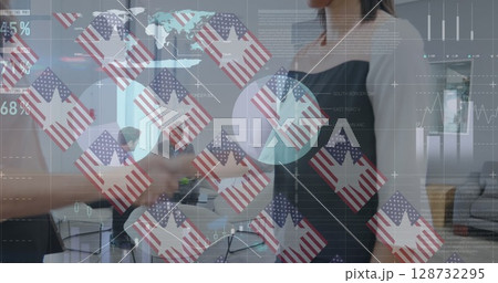 Shaking hands business professionals in modern office, with laptop and flag-themed data overlays Shaking hands business professionals in modern office, with laptop and flag-themed data overlays 128732295