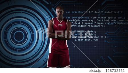 African american male basketball player against round scanner and data processing on blue background 128732331