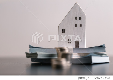 Business home concept involves strategic financial management money coin save bank real estate economic loan investment development growth encourage accountancy buy income stack investment economy 128732398