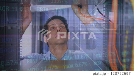 Image of financial data processing over caucasian server room worker 128732697