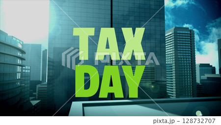 Displaying neon-green TAX DAY lettering on rooftop deck overlooking glass-and-steel skyscrapers 128732707