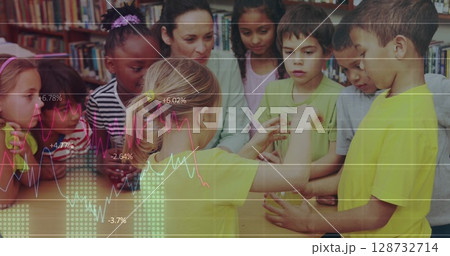 Observing adult guiding students examining transparent jar on table in library, with graph overlays 128732714