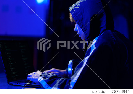 Hacker cyberattack representing data breach and cybersecurity threat in digital system Hacker cyberattack representing data breach and cybersecurity threat in digital system 128733944