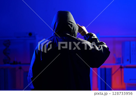 Anonymous hacker thief criminal man Anonymous hacker thief criminal man 128733956