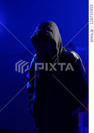 Anonymous hacker thief criminal man 128733959