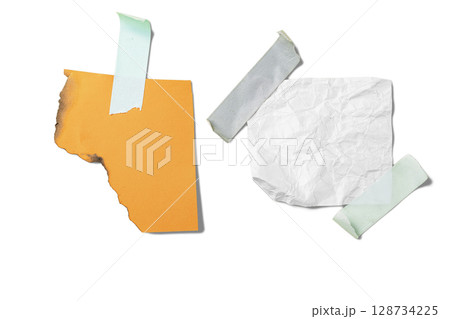 Burnt orange paper and white crumpled paper on adhesive masking tape isolated over a white background. Copy space Burnt orange paper and white crumpled paper on adhesive masking tape isolated over a white background. Copy space 128734225
