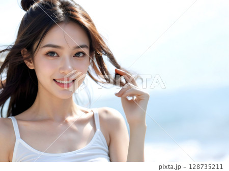 日差しを浴びる女性 128735211