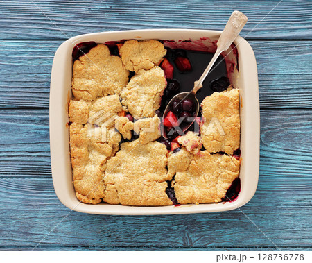 apple blueberry strawberry crumble in baking dish apple blueberry strawberry crumble in baking dish 128736778